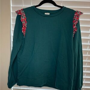 Green sweatshirt with floral ruffle. Super soft sweatshirt material.